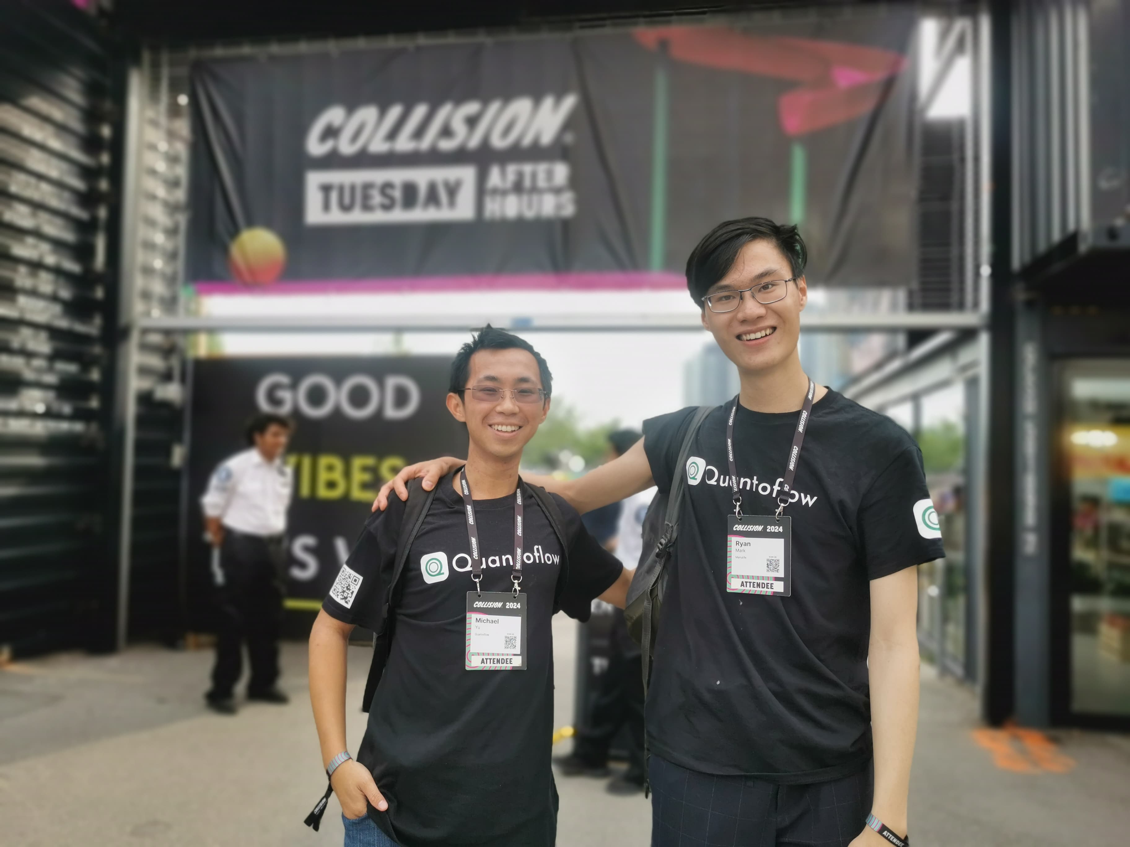The Quantoflow co-founders in branded shirts outside the Collision 2024 conference in Toronto